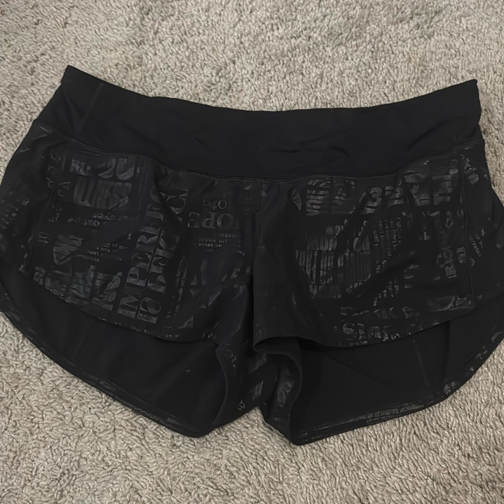 Black with words Lululemon Speed Up shorts